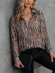 Milan Kiss Koszula w kolorze brązowo-czarnym rozmiar: S. Brązowe koszule damskie Milan Kiss, s, bez wzorów, bez kołnierzyka, bez ramiączek. Za 117.73 zł.