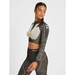 Damska bluza z zamkiem 1/2 crop Hummel MT Mila. Czarne bluzy bez kaptura damskie HUMMEL, bez wzorów, bez ramiączek, bez kaptura. W wyprzedaży za 213.50 zł.