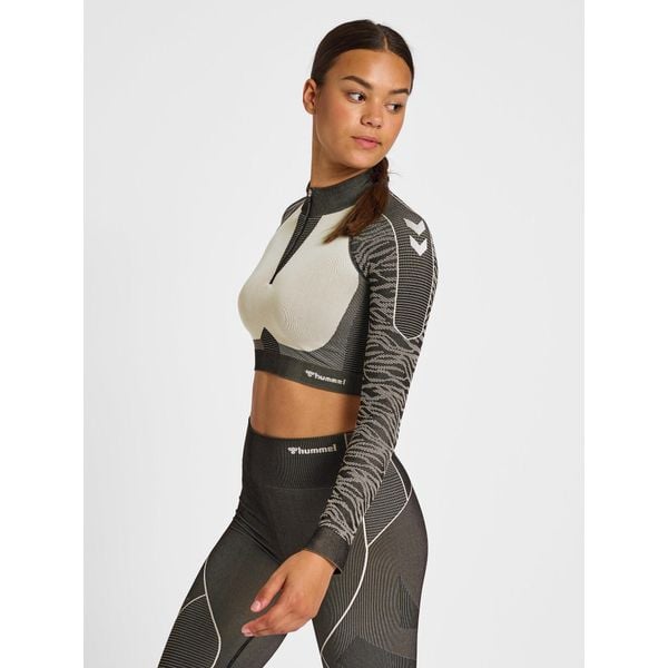 Damska bluza z zamkiem 1/2 crop Hummel MT Mila. Brązowe bluzy bez kaptura damskie HUMMEL, bez wzorów, bez ramiączek, bez kaptura. W wyprzedaży za 220.00 zł.