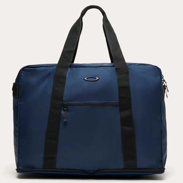Torba podróżna Oakley PACKABLE 42 L FOS901958-6GA. Niebieskie torebki klasyczne damskie Oakley, z aplikacjami, z materiału, bez dodatków. Za 272.39 zł.
