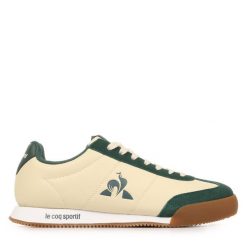 Buty Le Coq Sportif Footsport. Brązowe buty sportowe na co dzień męskie Le Coq Sportif, z materiału, bez zapięcia, na fitness i siłownię. Za 330.00 zł.