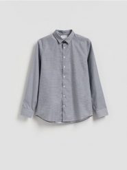 Wzorzysta koszula slim fit - granatowy. Niebieskie koszule męskie Reserved, l, bez wzorów, z bawełny, bez kołnierzyka, bez ramiączek. Za 129.99 zł.