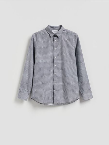 Wzorzysta koszula slim fit - granatowy. Niebieskie koszule męskie Reserved, l, bez wzorów, z bawełny, bez kołnierzyka, bez ramiączek. Za 129.99 zł.