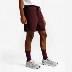 Spodenki męskie Elementals. Fioletowe szorty męskie Decathlon, bez wzorów, z dresówki. Za 79.99 zł.