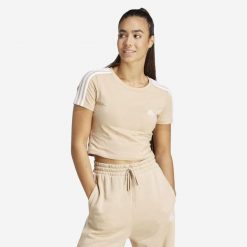 Koszulka damska ADIDAS Gym & Pilates crop slim. Białe t-shirty damskie Adidas, l, bez wzorów, z bawełny, bez kołnierzyka. Za 99.99 zł.