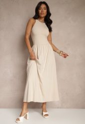 Jasnobeżowa Rozkloszowana Sukienka z Bawełny z Kieszeniami Lirevane. Brązowe sukienki damskie Renee, na co dzień, l, bez wzorów, z bawełny, eleganckie, bez kołnierzyka, bez ramiączek, maxi, rozkloszowane. W wyprzedaży za 104.99 zł.