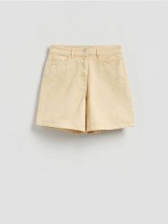 Jeansowe szorty - żółty. Żółte szorty damskie Reserved, bez wzorów, z bawełny. Za 99.99 zł.