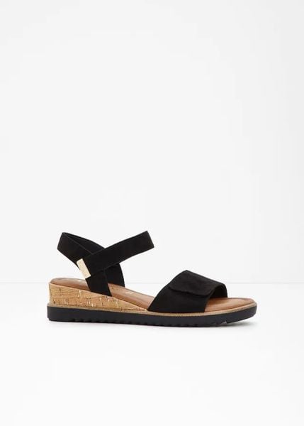 Sandały marki Tamaris na koturnie. Czarne sandały damskie bonprix, bez wzorów, bez obcasa, na koturnie. Za 259.99 zł.