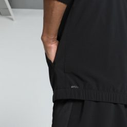 Męska kurtka do biegania VELOCITY PUMA Black. Czarne kurtki treningowe męskie Puma, m, bez wzorów, do biegania. Za 236.05 zł.