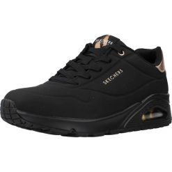 Tenisówki Skechers Model Uno Kolor Czarny. Czarne trampki i tenisówki damskie Skechers, bez wzorów, z gumy. Za 349.99 zł.