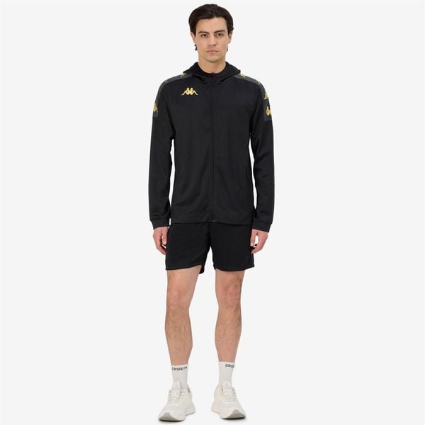 Kurtka z dresu Kappa Grevolo. Czarne kurtki męskie Kappa, bez wzorów, z dresówki, sportowe, bez kaptura. W wyprzedaży za 219.15 zł.