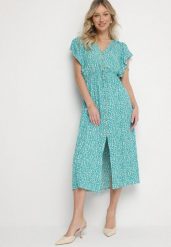 Zielona Bawełniana Sukienka Rozkloszowana w Cętki z Ozdobnymi Guzikami Alulune. Zielone sukienki damskie Born2be, na co dzień, l, bez wzorów, z bawełny, eleganckie, bez kołnierzyka, bez ramiączek, midi, kopertowe. W wyprzedaży za 51.99 zł.
