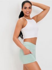 Dopasowane szorty sportowe Gym Hard - zielony. Zielone spodenki sportowe damskie Sinsay, l. W wyprzedaży za 24.99 zł.