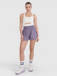 4F Spodenki treningowe szybkoschnące damskie 4F x Anna Lewandowska - fioletowe L. Fioletowe spodenki sportowe damskie 4f, l, z elastanu, na fitness i siłownię. Za 129.99 zł.
