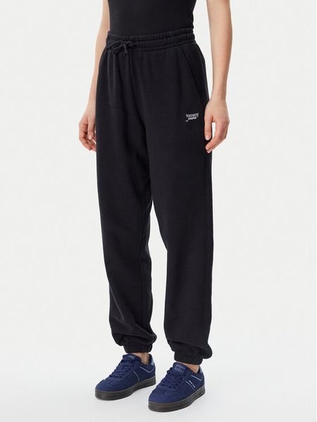 Tommy Jeans Spodnie dresowe Script DW0DW20670 Czarny Relaxed Fit. Czarne jeansy damskie Tommy Jeans, s, bez wzorów, z bawełny. Za 239.99 zł.