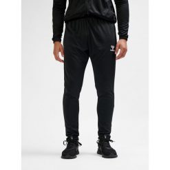 SPODNIE hmlESSENTIAL TRAINING PANTS. Czarne spodnie dresowe damskie HUMMEL, m, bez wzorów, z dresówki. Za 150.00 zł.