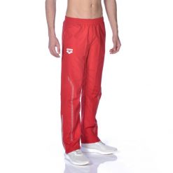 Spodnie dresowe Arena Team Line Warm Up Pant. Czerwone spodnie sportowe damskie Arena, l, z dresówki, na fitness i siłownię. Za 118.99 zł.