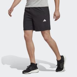 Spodenki krótkie treningowe męskie adidas Essentials. Białe szorty męskie Adidas, z materiału, bez kołnierzyka. Za 119.00 zł.