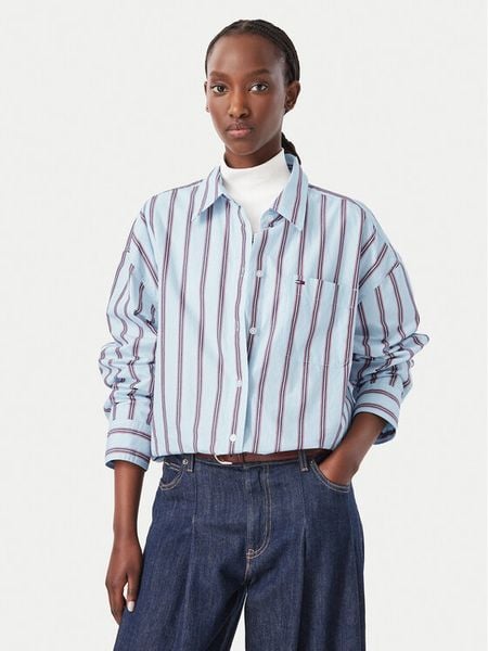 Tommy Jeans Koszula Essential DW0DW23340 Niebieski jasny Oversize. Niebieskie koszule damskie Tommy Jeans, xxs, bez wzorów, z bawełny, bez kołnierzyka, bez ramiączek. Za 449.99 zł.
