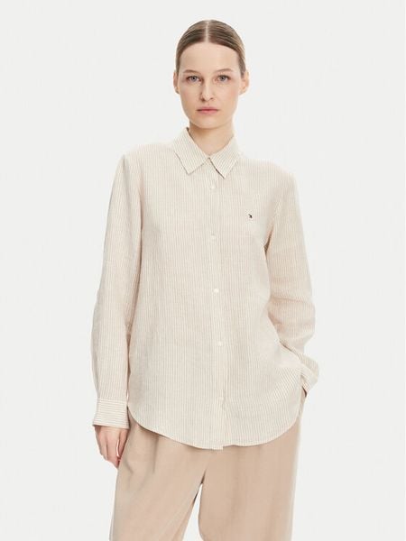 Tommy Hilfiger Koszula WW0WW44679 Beżowy Relaxed Fit. Brązowe koszule damskie Tommy Hilfiger, bez wzorów, ze lnu, bez kołnierzyka, bez ramiączek. Za 279.99 zł.