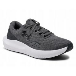 Buty do biegania męskie UNDER ARMOUR CHARGED SURGE siateczka. Szare obuwie do biegania damskie Under Armour. Za 249.00 zł.