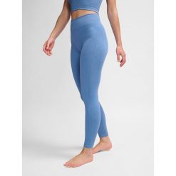 Damskie legginsy bezszwowe Hummel MT Adapt MW. Fioletowe legginsy damskie HUMMEL, bez wzorów. Za 170.00 zł.