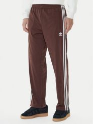 Adidas Spodnie dresowe adicolor Classics Firebird KA0482 Brązowy Regular Fit. Brązowe spodnie dresowe męskie Adidas, bez wzorów, z dresówki. Za 239.99 zł.