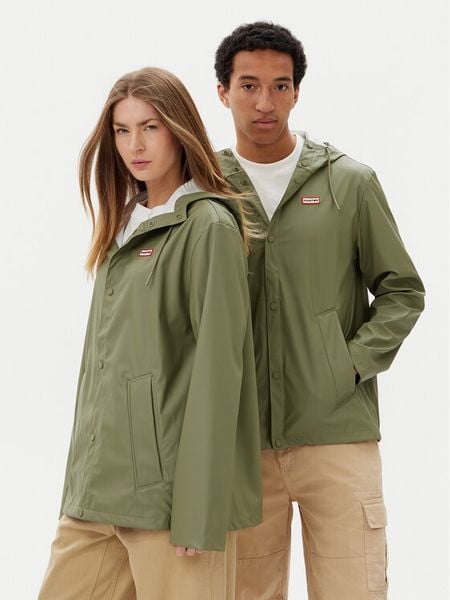 Hunter Kurtka przeciwdeszczowa Izzy Unisex HARU0012251 Khaki Regular Fit. Brązowe kurtki damskie Hunter, xxl, bez wzorów, z syntetyku, bez kaptura. Za 219.99 zł.