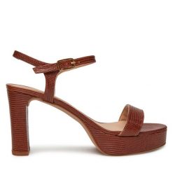 Sandały Unisa. Brązowe sandały damskie Unisa, bez wzorów, bez obcasa, na słupku. Za 429.99 zł.