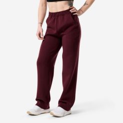 Spodnie dresowe damskie Domyos. Fioletowe spodnie sportowe damskie Decathlon, l, z dresówki, na fitness i siłownię. Za 129.99 zł.