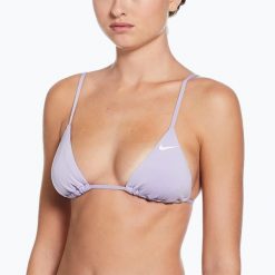 Góra od stroju pływackiego Nike Essential Triangle Bikini. Niebieskie bikini damskie Nike, bez wzorów. Za 99.99 zł.