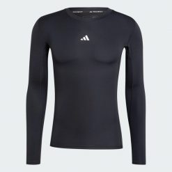 Koszulka TECHFIT Compression Training Long Sleeve. Czarne t-shirty sportowe męskie Adidas, l, z dzianiny, bez ramiączek, na fitness i siłownię, techfit (adidas). Za 179.00 zł.