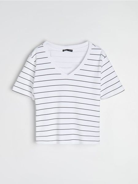Bawełniana koszulka z gęstego splotu Interlock - wielobarwny. Bluzki sportowe damskie Sinsay, l, bez wzorów, z bawełny, bez kołnierzyka. Za 25.99 zł.