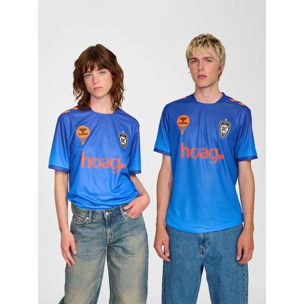 Koszulka domowa Hummel Orange County 2025/26. Białe bluzki damskie HUMMEL, bez wzorów, bez kołnierzyka. Za 340.00 zł.