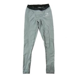 Second life - Legginsy męskie Gymshark szare - Stan bardzo dobry. Szare spodnie sportowe męskie Gymshark, z materiału. Za 127.76 zł.
