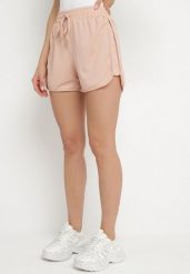 Jasnoróżowe Szorty z Gumką w Pasie i Ozdobnym Sznurkiem Milarisa. Czerwone szorty damskie Born2be, bez wzorów, eleganckie. Za 34.99 zł.
