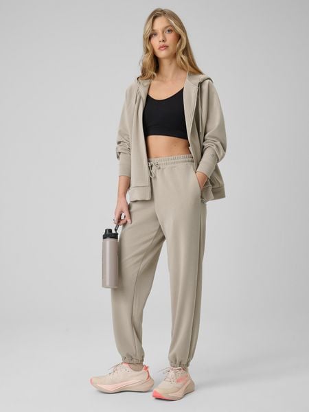 4F Spodnie z szerokimi nogawkami z modalem damskie - beżowe S. Brązowe spodnie dresowe damskie 4f, s, bez wzorów, z dresówki. Za 189.99 zł.