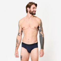 Slipki sportowe męskie. Niebieskie slipki męskie KALENJI, bez wzorów, z elastanu. Za 24.99 zł.