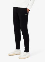 Spodnie dresowe bawełniane Lacoste. Czarne spodnie sportowe męskie Lacoste, z bawełny. Za 412.85 zł.