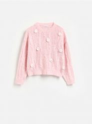 Sweter z kwiatową aplikacją - różowy. Czerwone swetry klasyczne damskie Reserved, l, z dzianiny, bez kołnierzyka. Za 129.99 zł.