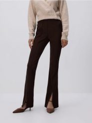 Legginsy z rozcięciami - ciemnobrązowy. Brązowe legginsy damskie Reserved, l, bez wzorów, z dzianiny. Za 89.99 zł.