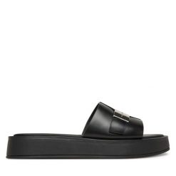 Klapki Calvin Klein. Czarne klapki damskie CALVIN KLEIN, bez wzorów, bez obcasa. Za 329.99 zł.