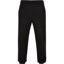 Spodnie do biegania Urban Classics Ultra Heavy GT. Czarne spodnie materiałowe męskie Urban Classics, bez wzorów, z bawełny, eleganckie. Za 304.50 zł.