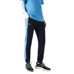 Spodnie turystyczne męskie Lacoste Sport. Niebieskie spodnie sportowe męskie Lacoste, z dresówki. Za 297.00 zł.