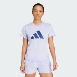 Koszulka Run It. Fioletowe bluzki damskie Adidas, xs, bez kołnierzyka, bez ramiączek. Za 139.00 zł.