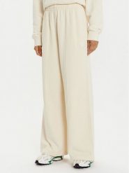 Lacoste Spodnie dresowe XF2657 Écru Wide Leg. Spodnie dresowe damskie Lacoste, bez wzorów, z bawełny. Za 359.99 zł.