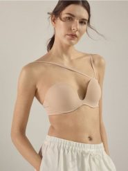 Biustonosz balconette push up - kremowy. Białe biustonosze Reserved, bez wzorów, z dzianiny. W wyprzedaży za 65.99 zł.