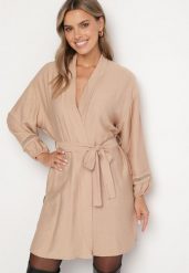 Beżowa Wiskozowa Sukienka Kimono z Kieszeniami i Ozdobnymi Ażurowymi Wstawkami Salanora. Brązowe sukienki damskie Born2be, na imprezę, l, w ażurowe wzory, z wiskozy, bez kołnierzyka, bez ramiączek, mini. Za 109.99 zł.