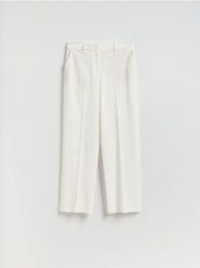 Spodnie z wiskozą - biały. Białe spodnie materiałowe damskie Reserved, bez wzorów, z tkaniny. Za 139.99 zł.