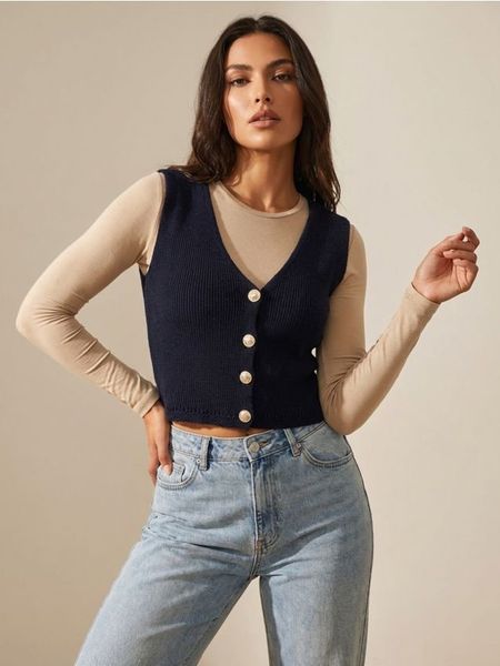 Bawełniana kamizelka z ozdobnymi guzikami - granatowy. Niebieskie kamizelki damskie Sinsay, l, z bawełny. Za 45.99 zł.